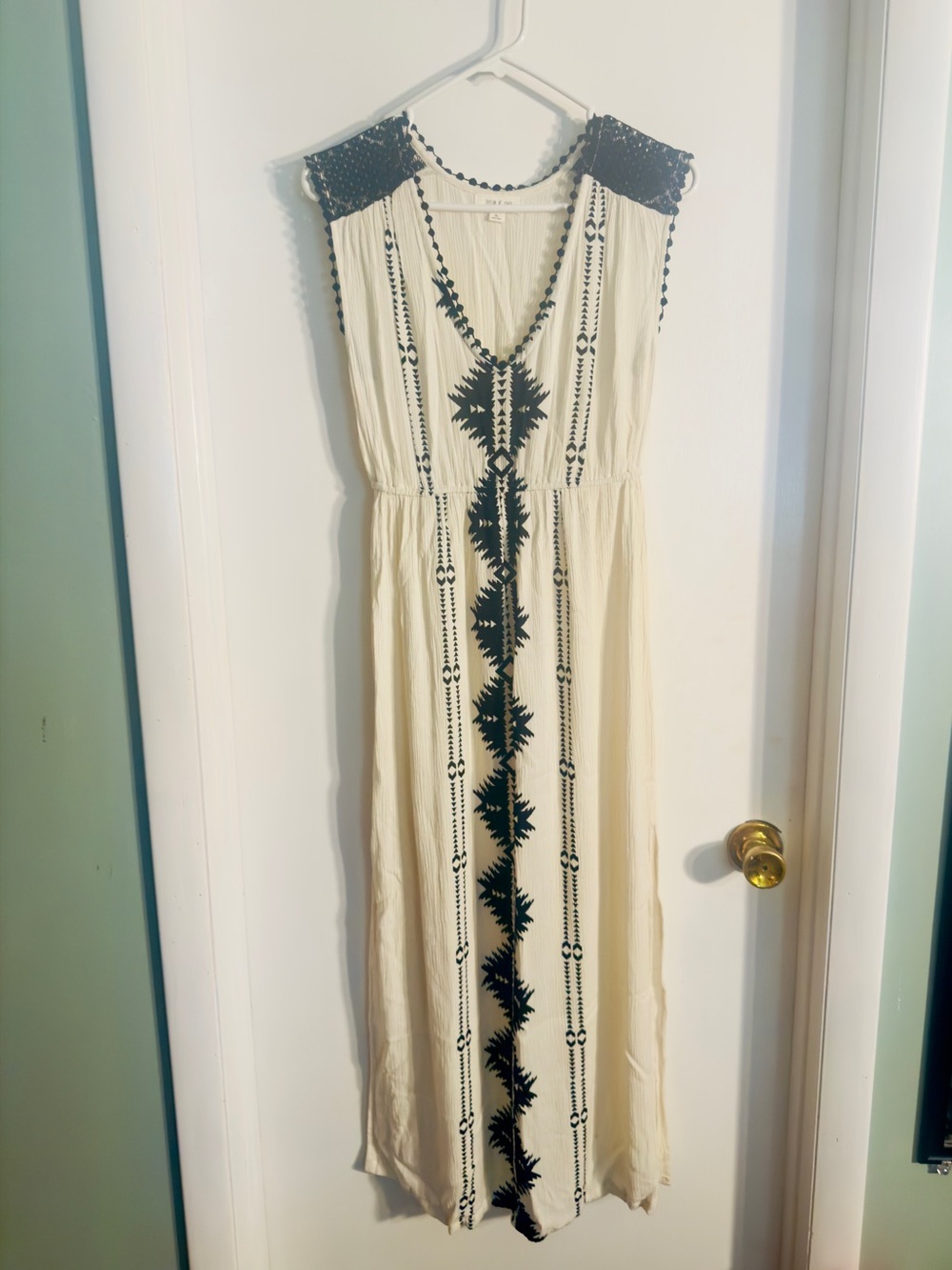 Sleeveless Cream Maxi beach Dress with Black Embroidered Trim